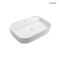Oltens Dal umywalka nablatowa przyścienna 52x41 cm owalna z powłoką SmartClean biała 40837000
